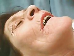 Wrinkly Granny Plays with a Cock