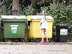 Cutie pulls up her short dress to pee in public