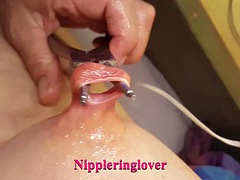 Nippleringlover - Milf cleans extremely stretched nipple piercing close up