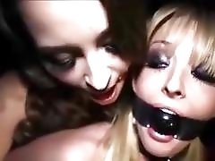 BDSM lezdom bitches with mouth gags kiss and get freaky