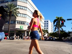 Street voyeur follows a gorgeous blonde babe in tight shorts